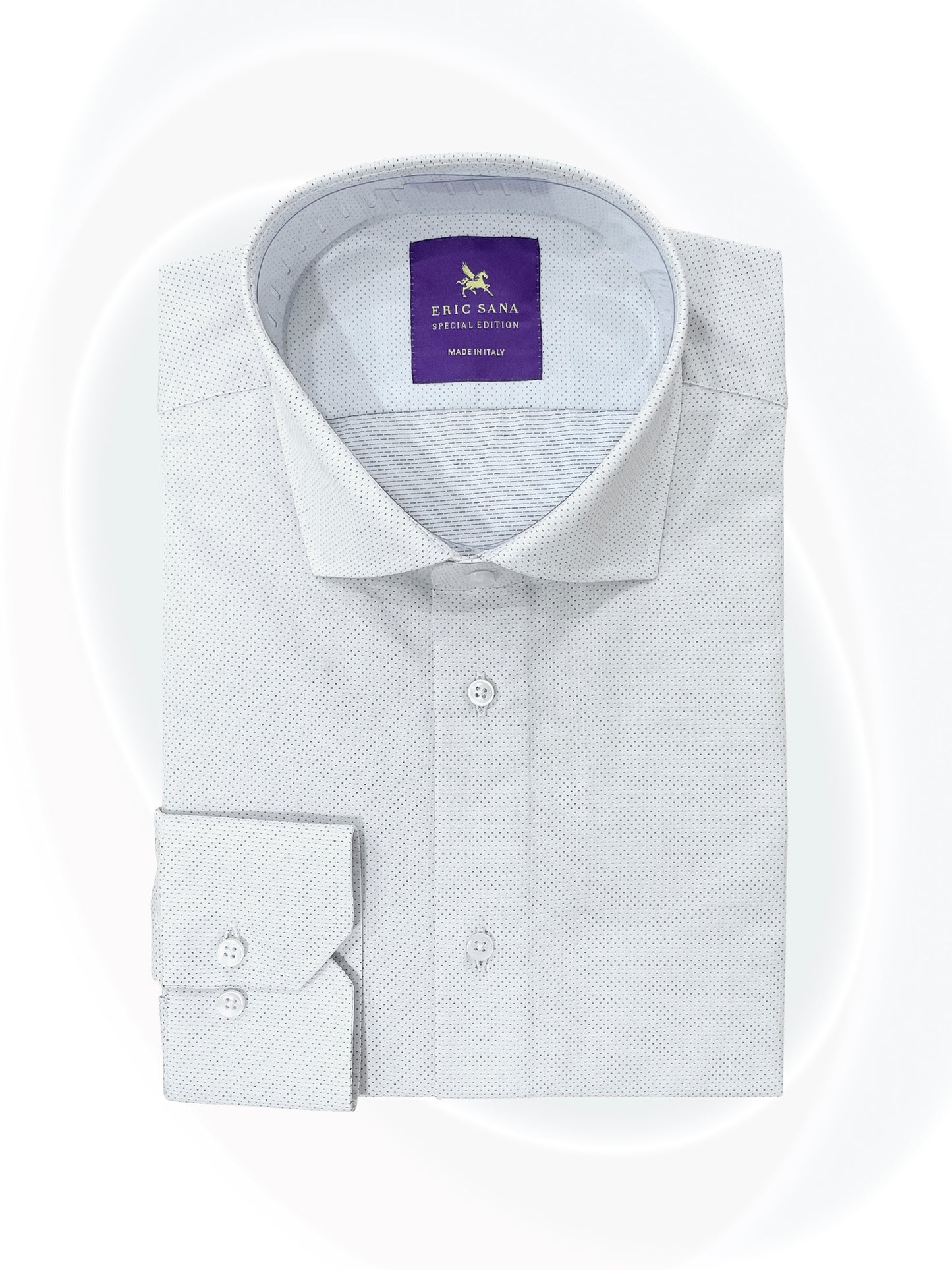 Dotted white dress shirt folded