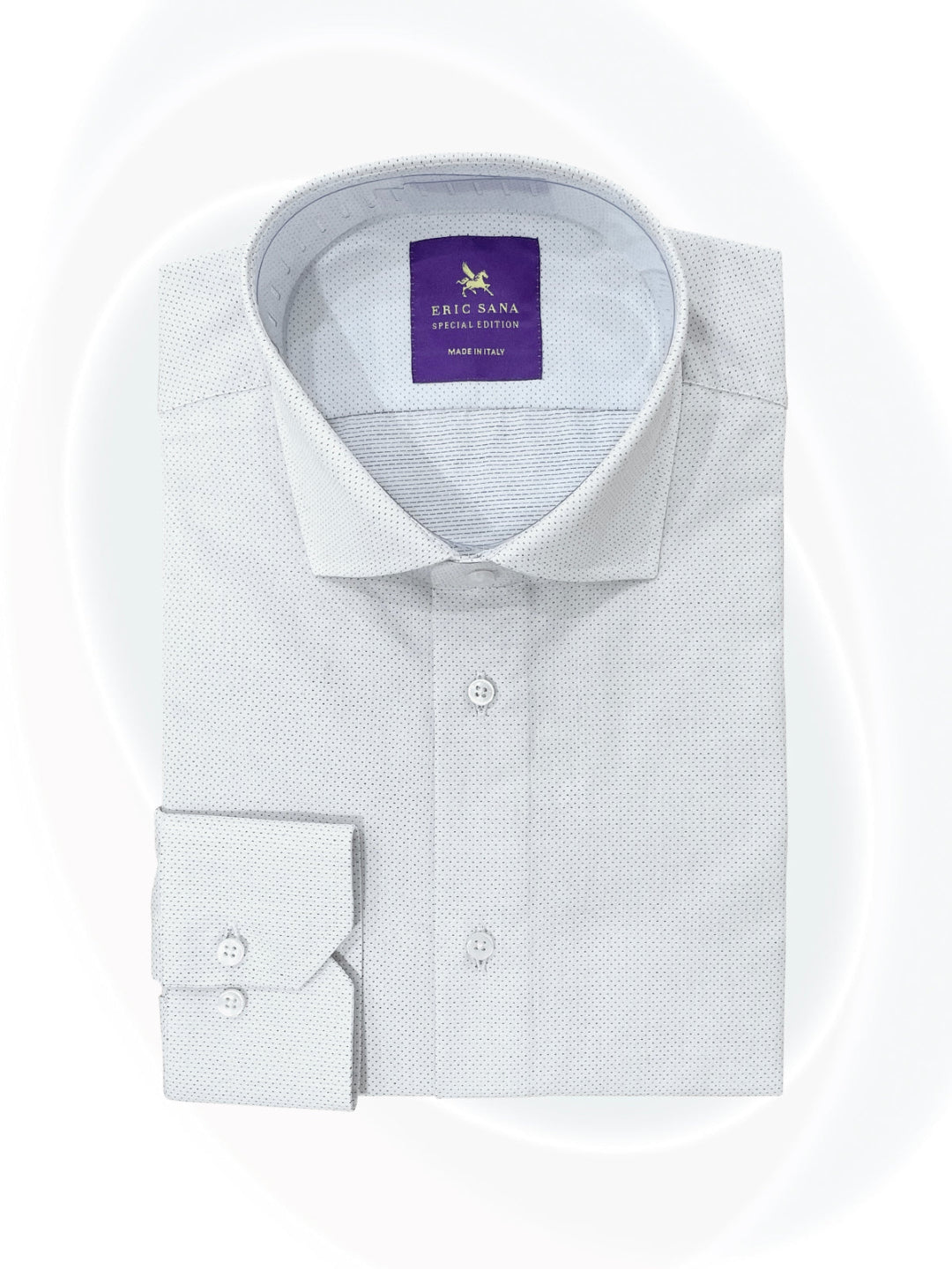 Dotted white dress shirt folded