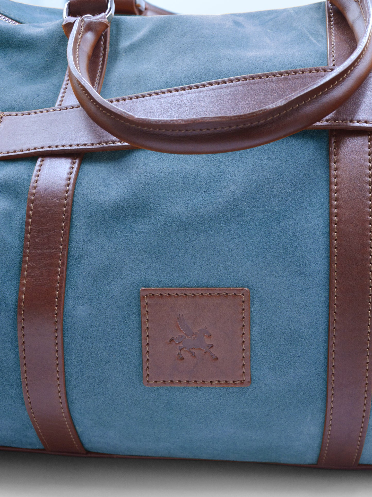 Sac de sport en daim et cuir