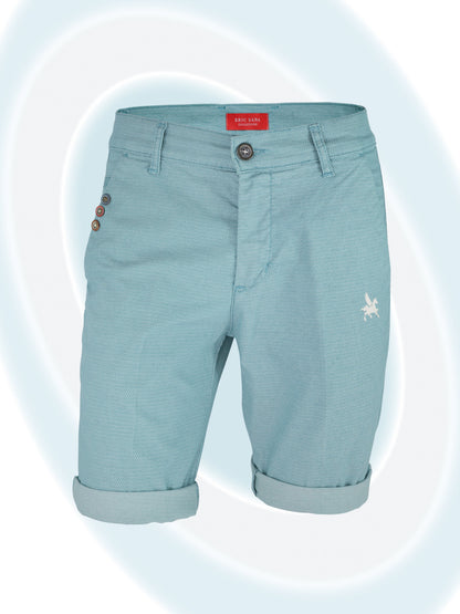 Light blue shorts with a brand label on a light blue background