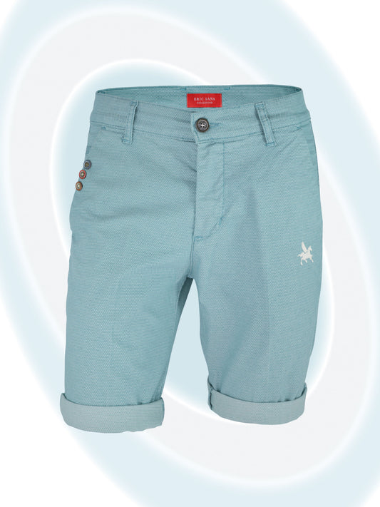 Light blue shorts with a brand label on a light blue background