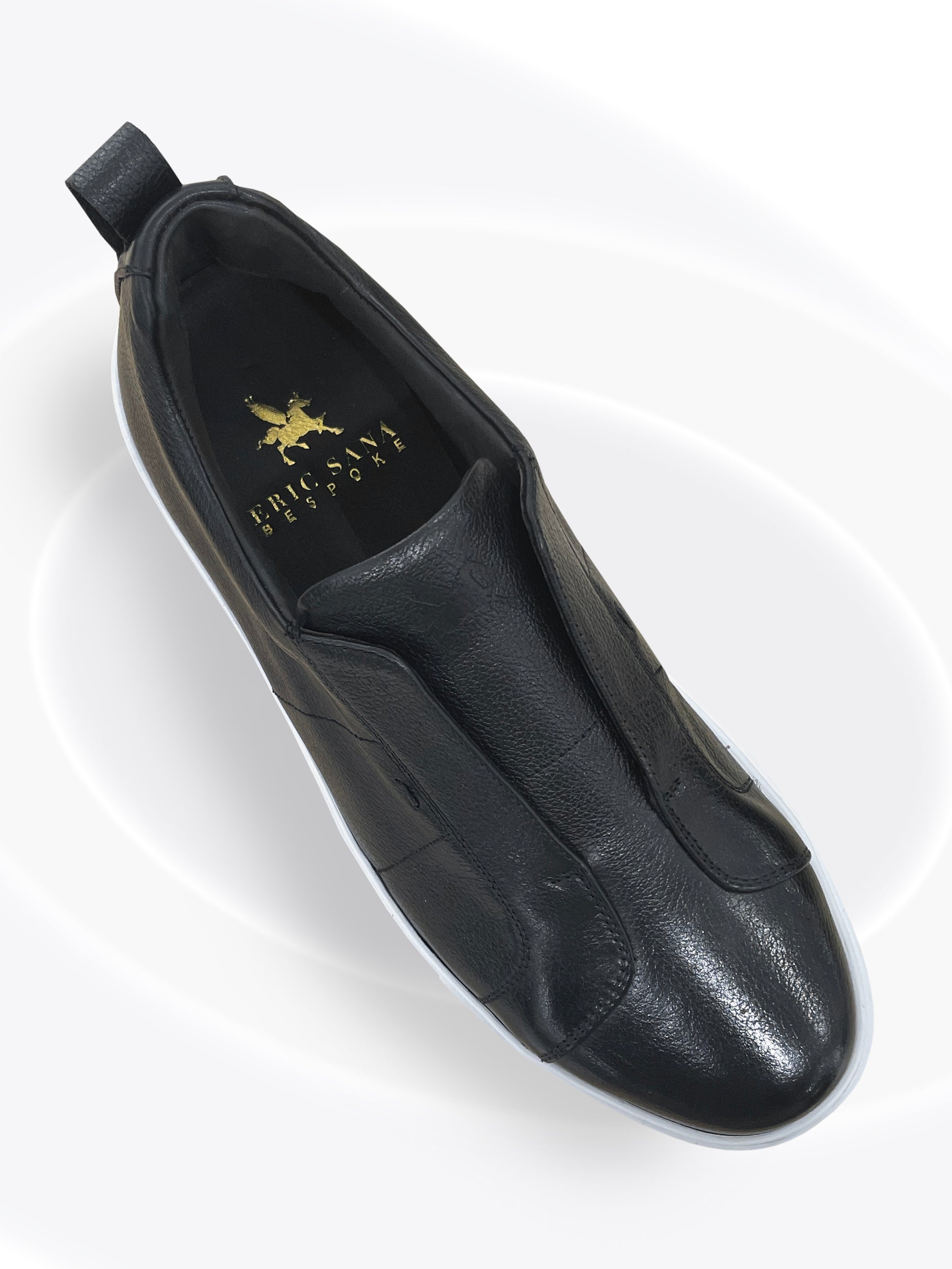Black leather shoe with a brand logo on a white background