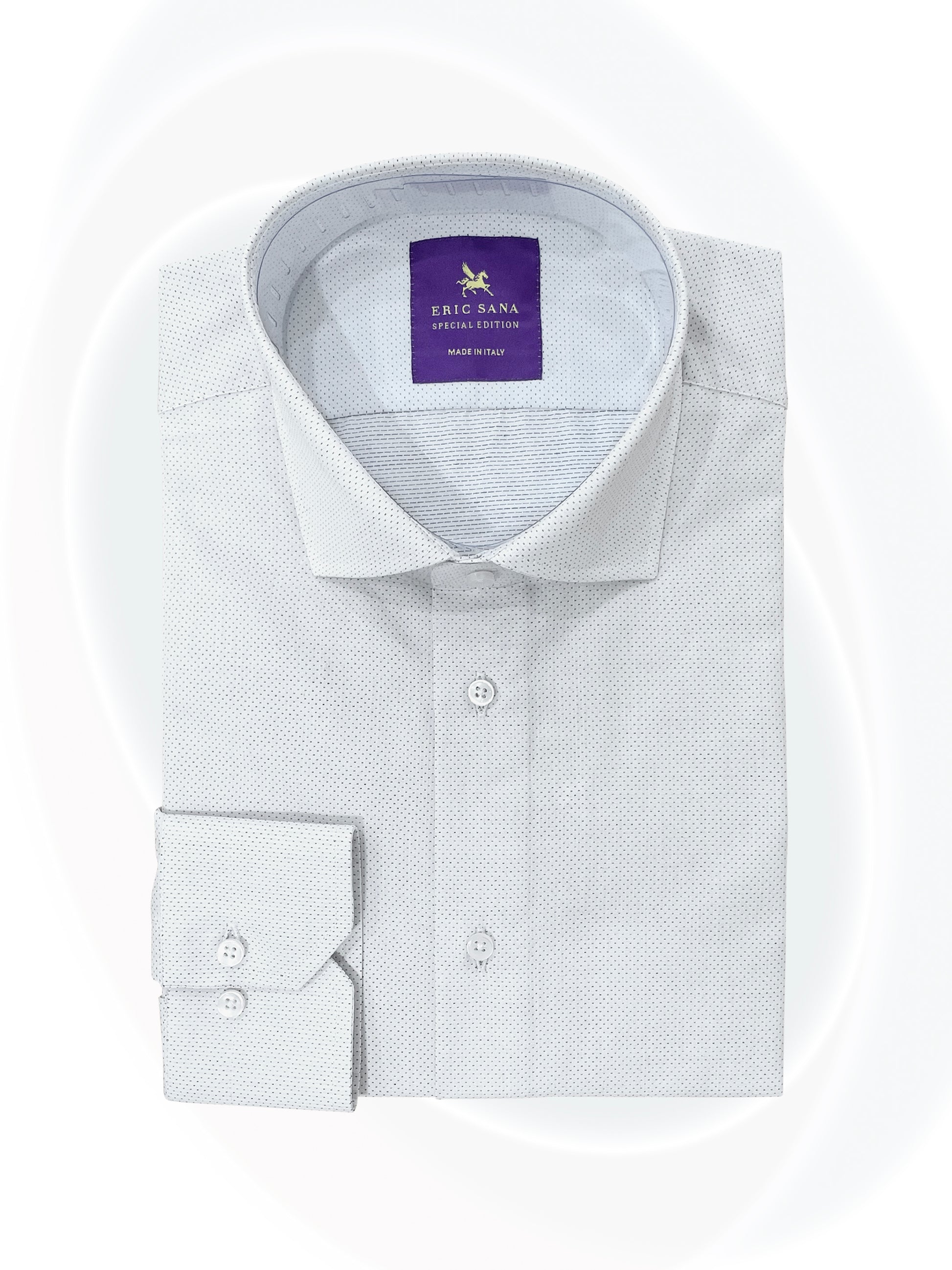 Dotted white dress shirt folded