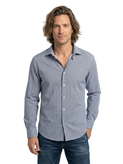 Man wearing a blue checkered shirt on a white background