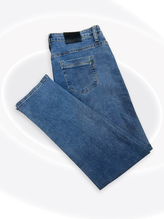 A pair of folded blue denim jeans with a classic five-pocket design, shown on a clean white background with subtle concentric circle graphics.