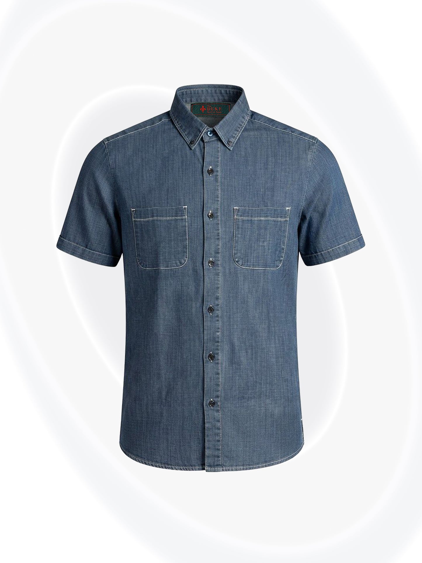A short-sleeve denim button-up shirt with two chest pockets, shown on a light gray background with subtle white circular accents.