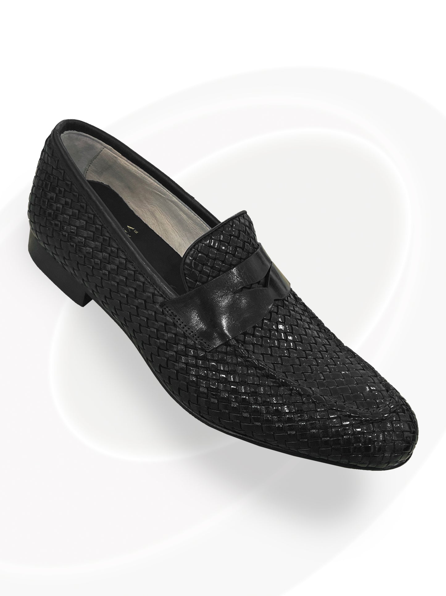 Brown woven loafer shoe on a white background