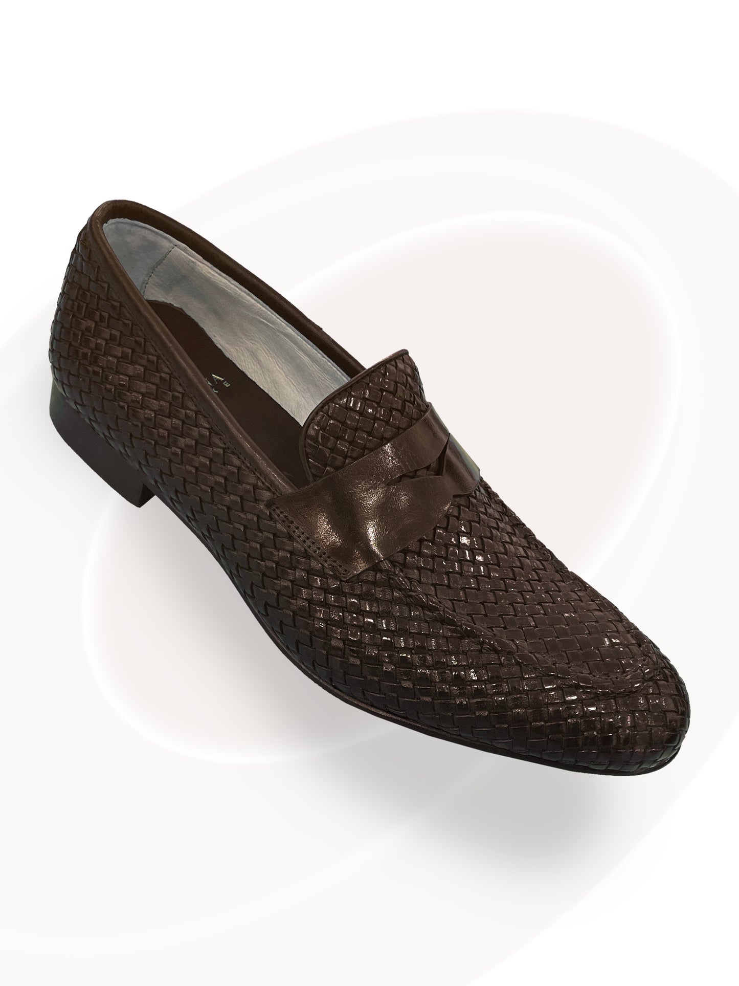 Brown woven loafer shoe on a white background