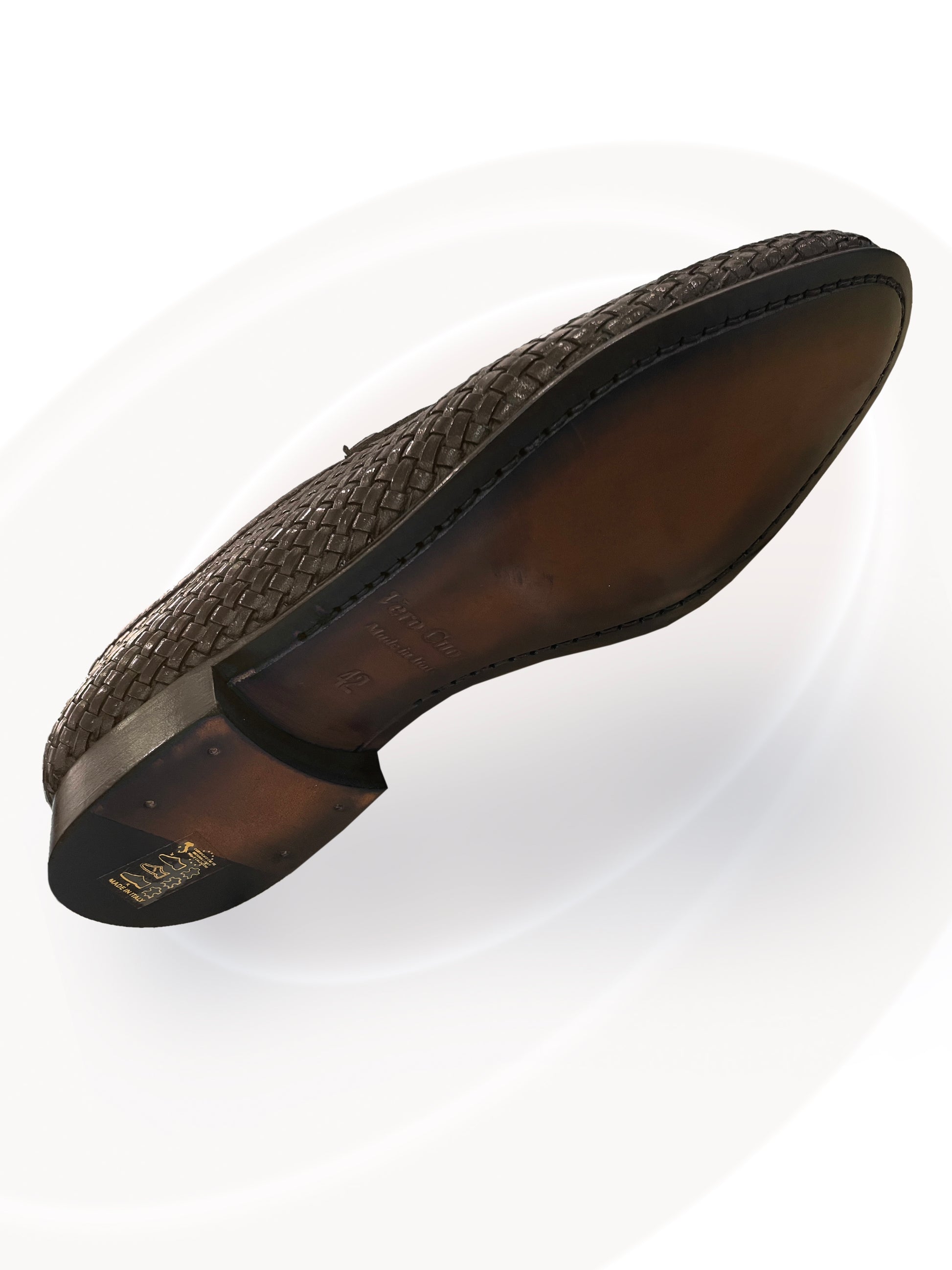 Brown shoe sole on a white background