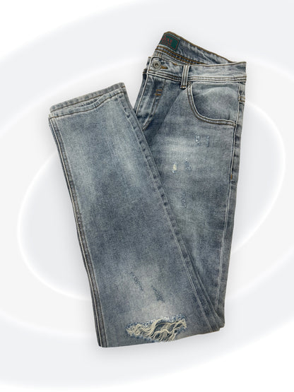 Folded pair of blue jeans