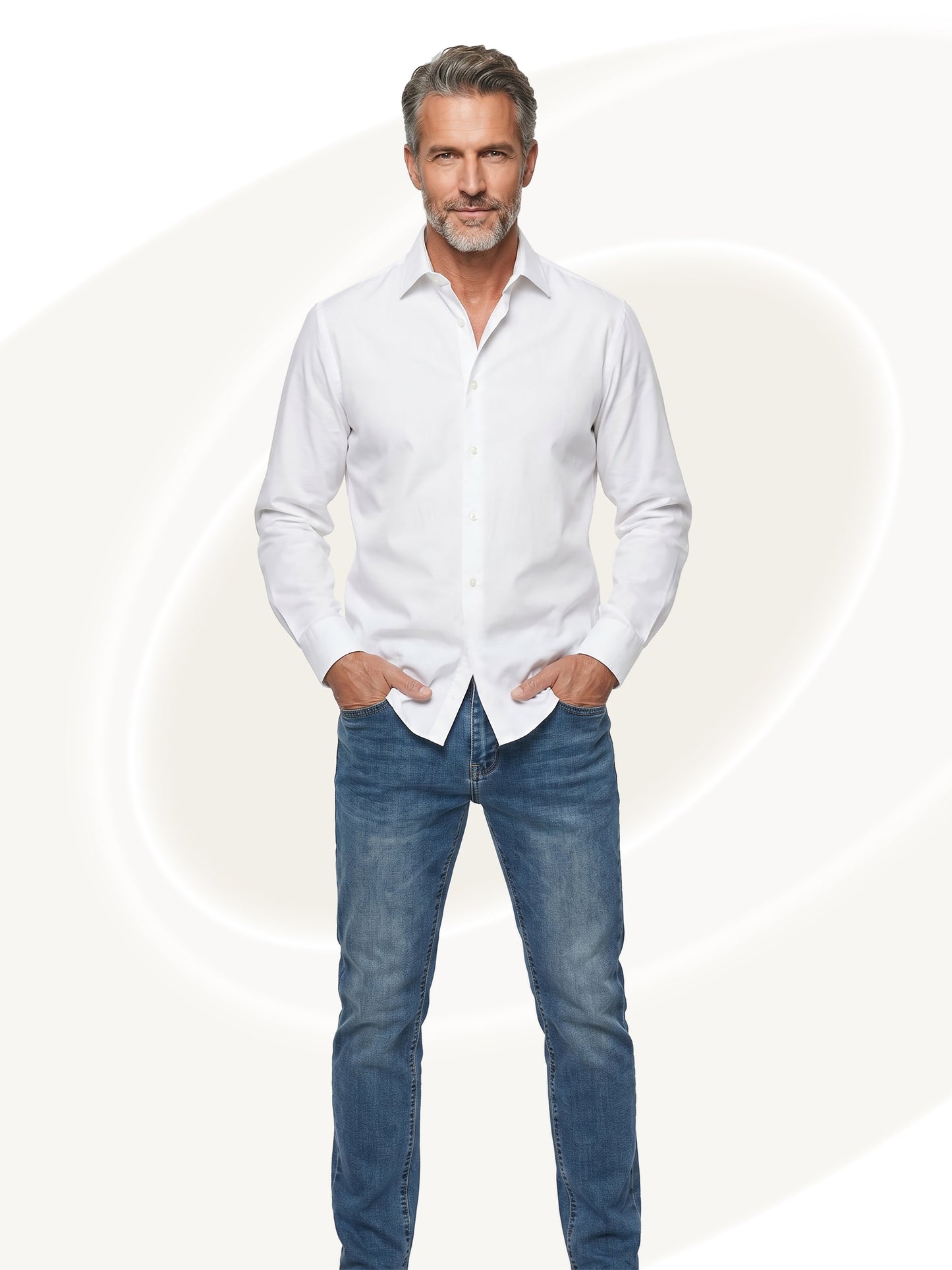 Man wearing a white shirt and blue jeans on a white background