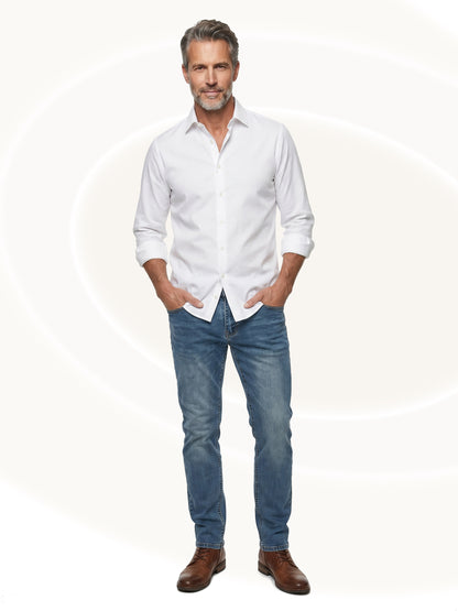 Man wearing a white shirt and blue jeans on a white background