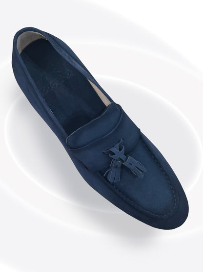 Navy blue loafer shoe on a white background