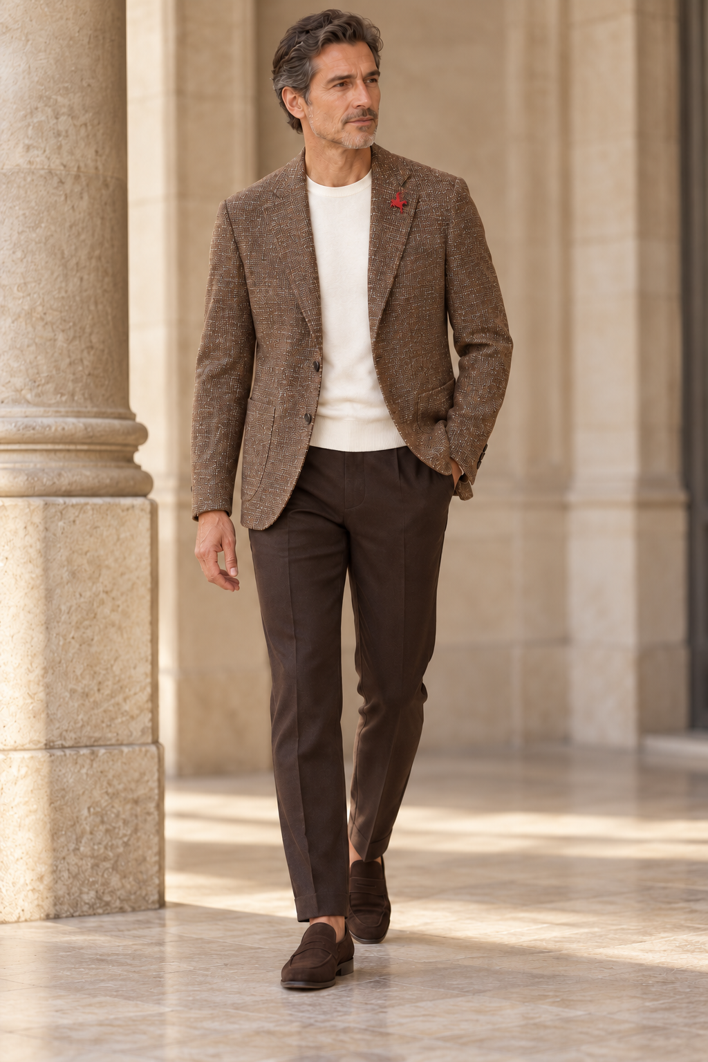 Eric Sana Giacca Feligno with red Pegasus lapel pin, styled with an ivory T-shirt