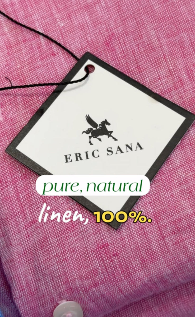 Pink fabric with an Eric Sana label indicating 100% linen.