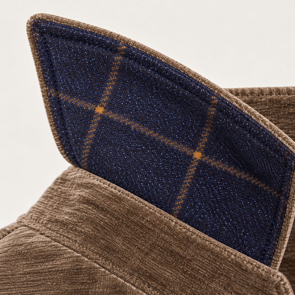 Close-up of Viani shacket blue plaid contrast fabric beneath the collar